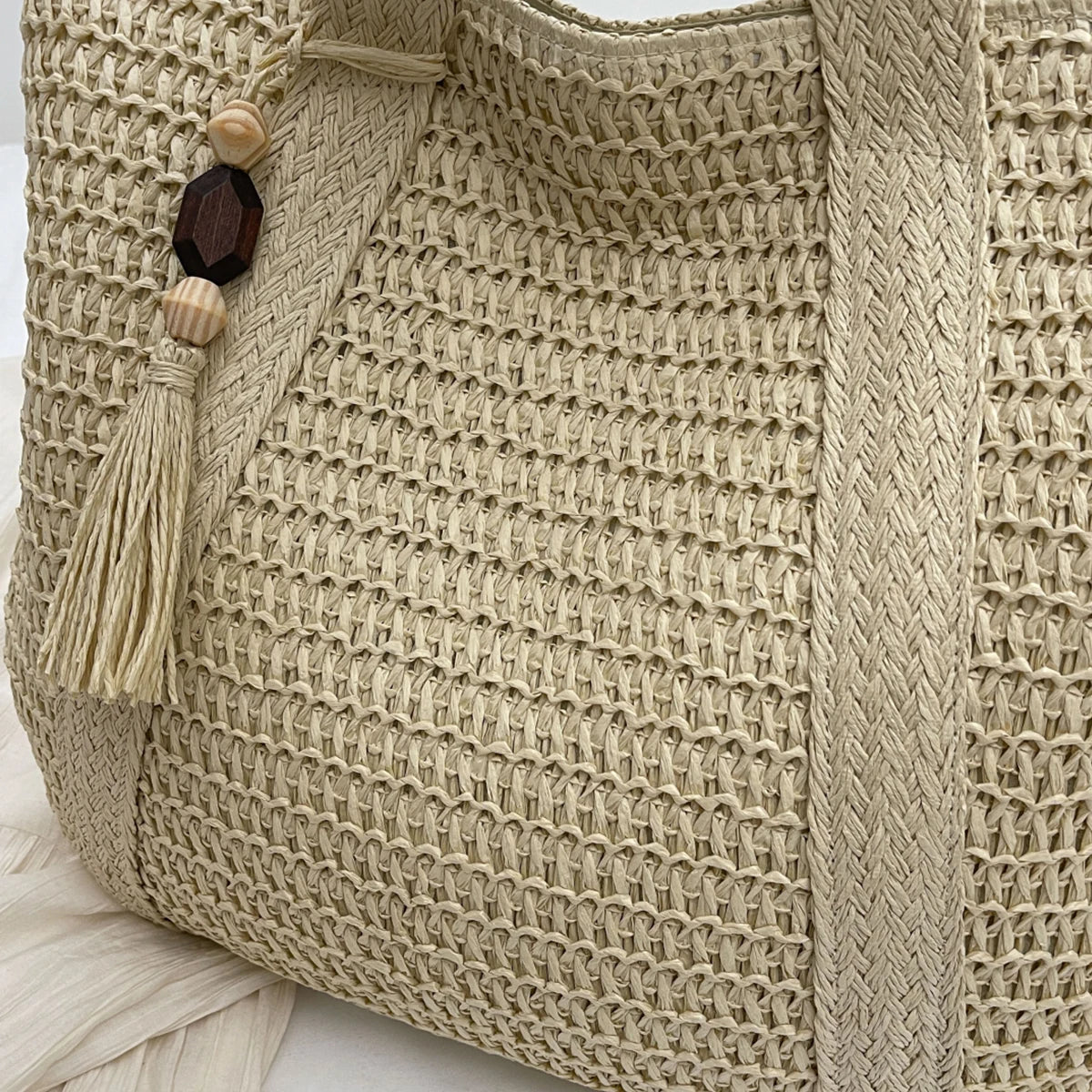 Bolso de paja tejido de gran capacidad para mujer 2025, nuevo bolso informal versátil con un solo hombro para cesta de verduras, bolso de playa para vacaciones en la playa, ropa de trabajo para ir al extranjero, bolso