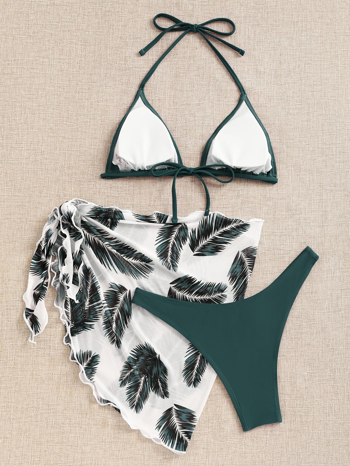 Bikini con top triangular y falda envolvente estampada de hojas