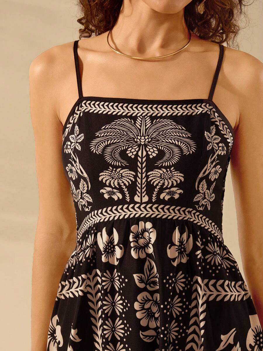 Vestido Largo Boho Negro con V-Neck y Estampa Tropical