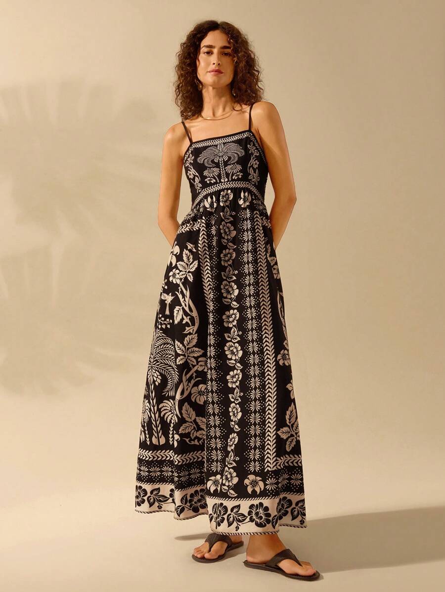 Vestido Largo Boho Negro con V-Neck y Estampa Tropical