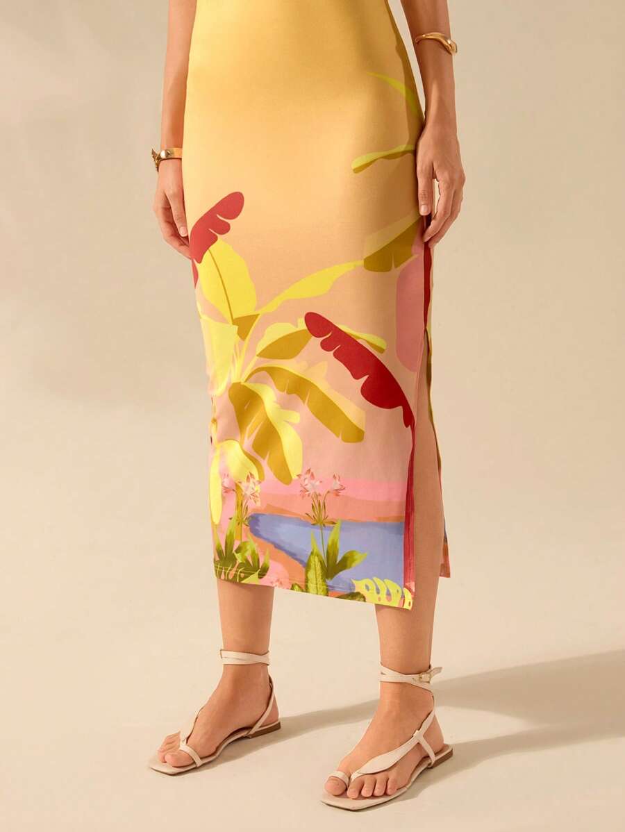 Vestido entallado azul con estampado tropical y loro