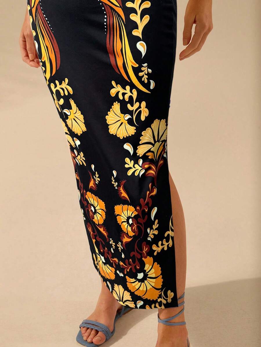 Vestido entallado azul con estampado tropical y loro