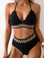 Bikini geométrico negro y azulcon detalles de cordones